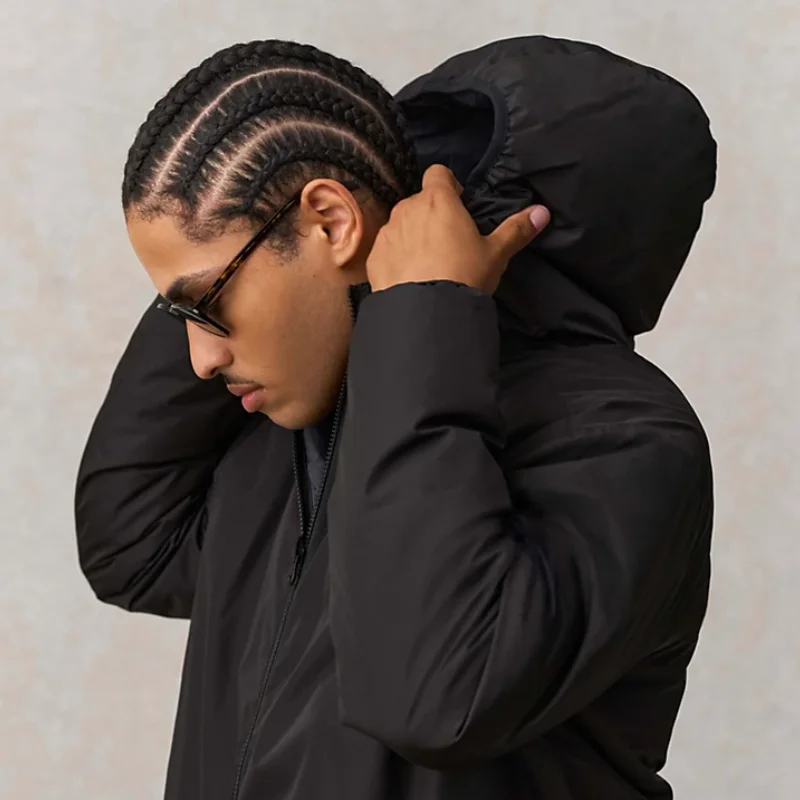 Dettaglio del cappuccio integrato del parka reversibile unisex Pro&Motion.